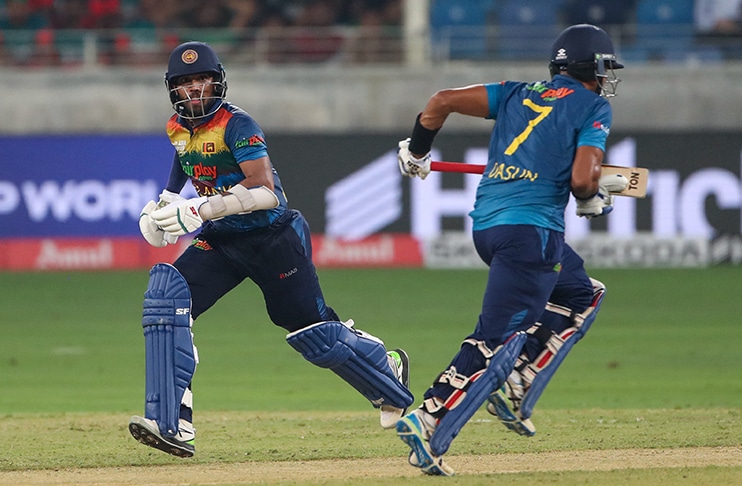 Sri Lanka sink Bangladesh in high-scoring thriller to qualify for Super 4s