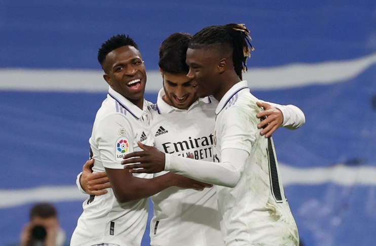 Asensio, Vinicius sink Valencia as Real narrow gap to leader Barca