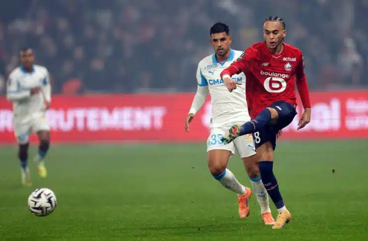 Lille's Mbappe nets winner to deny Marseille top spot